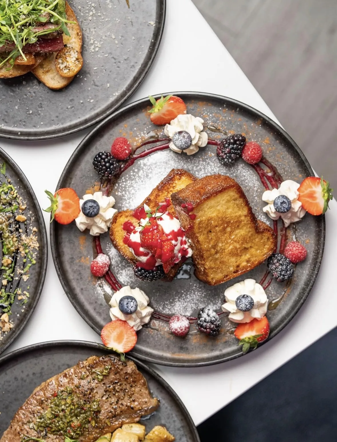 French toast with strawberries, blackberries and cream